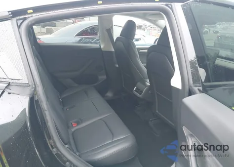 2024 Tesla Model Y из США, поврежденный, VIN 7SAYGDED1RF159399